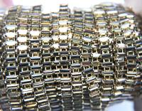Swarovski Snake Baguette chain 7x3 mm in Smoky Quartz (225) settings in Brass 0.5/1/2 Meters
