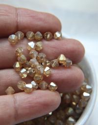 Swarovski (5mm) Crystal Golden flare Bicones 12/36/72/144/288/720 Pieces embroidery materials, jewelry supplies, craft supplies, decoration
