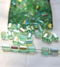 5230 Swarovski vintage cylindrical crystal beads Peridot Aurora Boreale mm 9x6 Swarovski Elements 6/12/36 Pieces, vintage findings