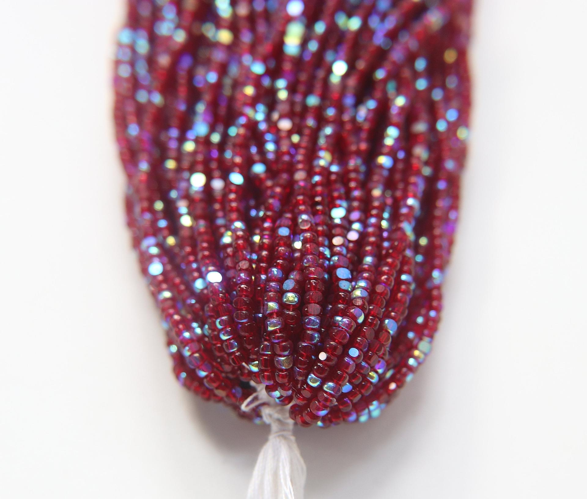 8/0 Hanks Charlotte Cut Beads Patina Transparent Garnet Aurore Boreale Hanks PREMIUM SEED BEADS Native Supplies ornament making