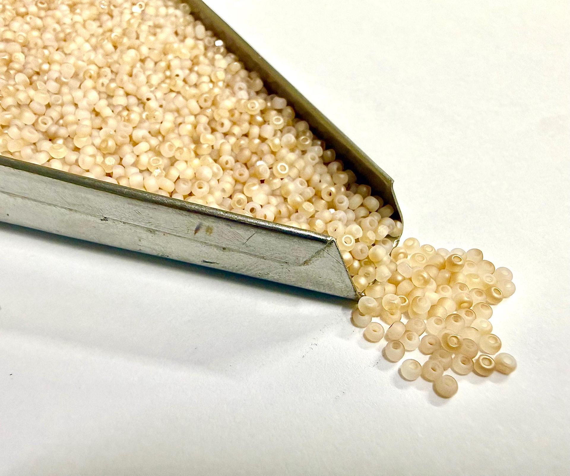 11/0 Charlotte Cut Beads: Matte White Opal Honey